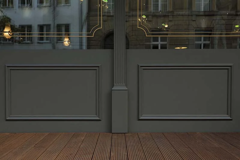 Foto einer dunkel gestrichenen Holzfassade mit Glasfront
